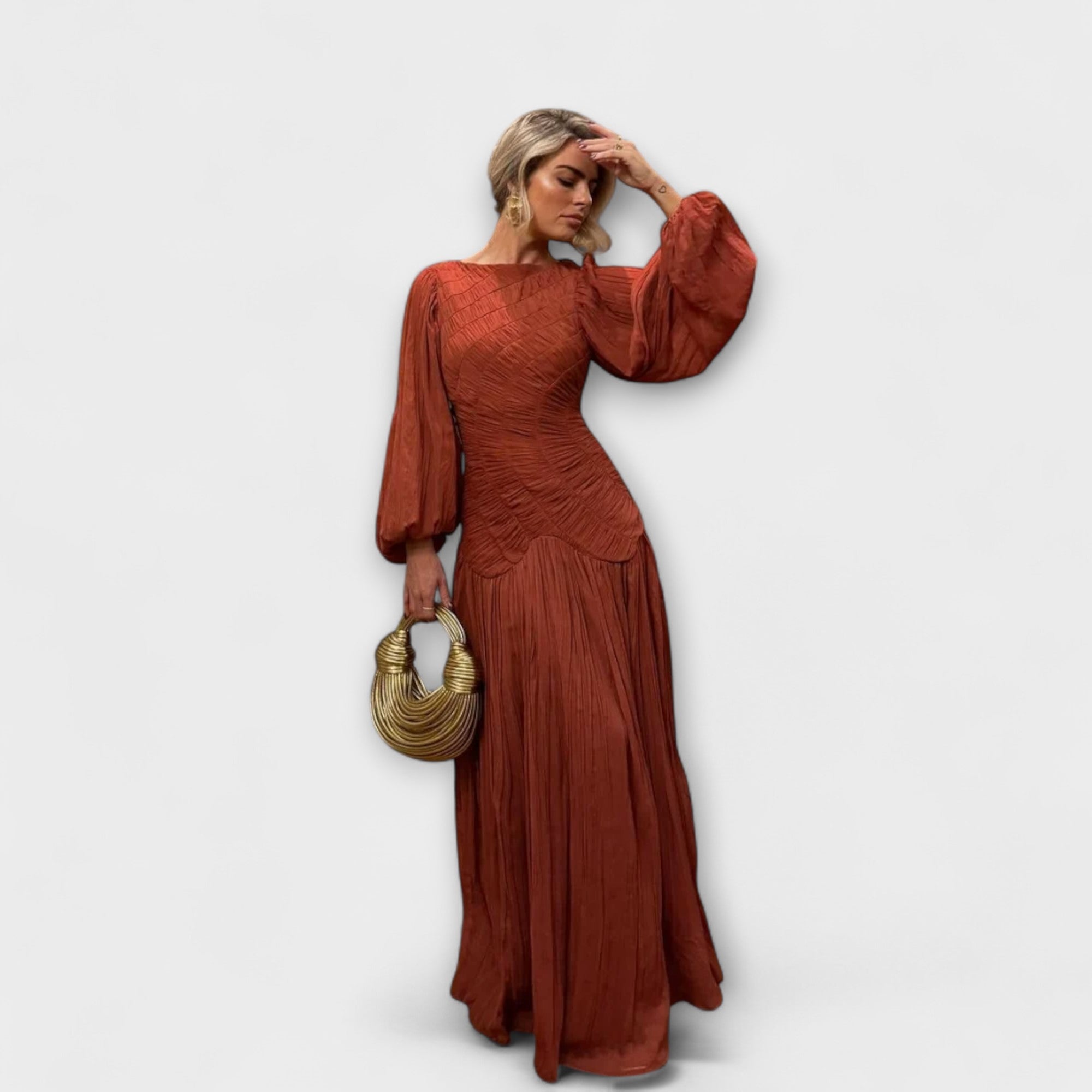 Vestido plisado elegante con mangas largas